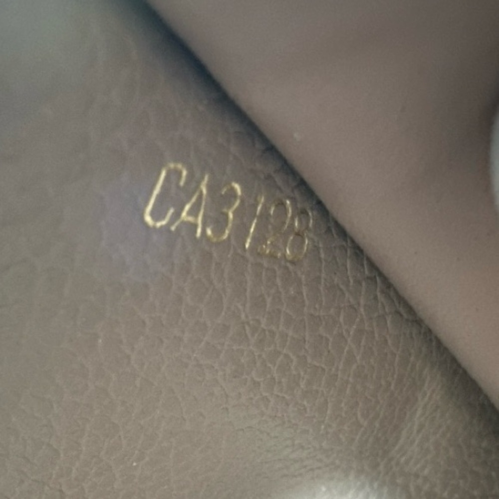 Louis Vuitton Monogram Empreinte Leather Sarah Wallet in Neutral - Picture 6 of 15